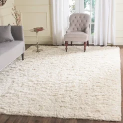 Ivory Solid Knotted Area Rug - (6'x9') - Safavieh