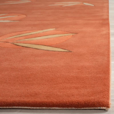 Telford Floral Tufted Rug Orange - Safavieh